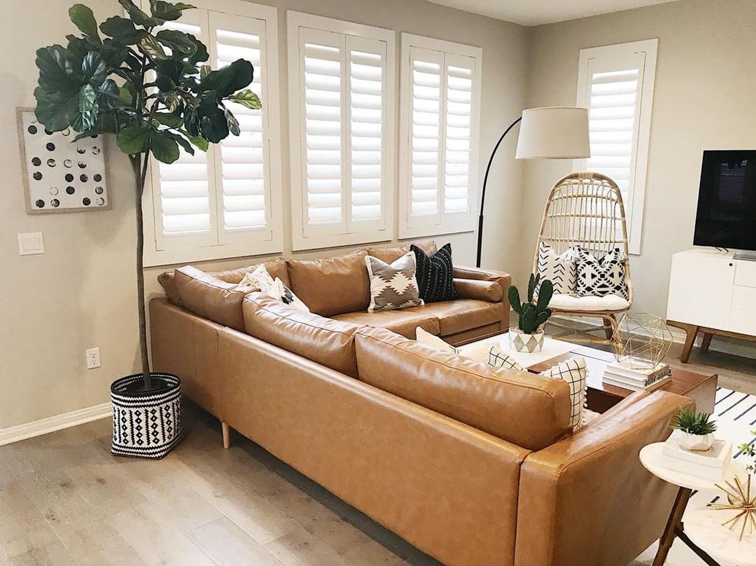 Comfortable living room with Polywood shutters in Minneapolis.